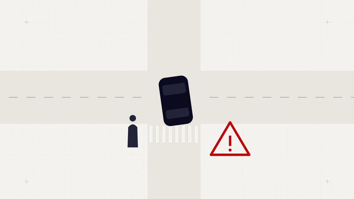 Top-down illustration of a road junction with a car, pedestrian crossing and red warning triangle